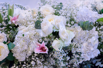 Close up Bunch of wedding flower. Image in blue light party event.
