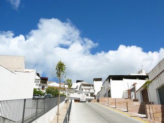 Spring sky above Village street