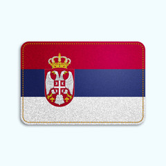Obraz premium National flag of Serbia with denim texture and orange seam. Realistic image of a tissue made in vector illustration.