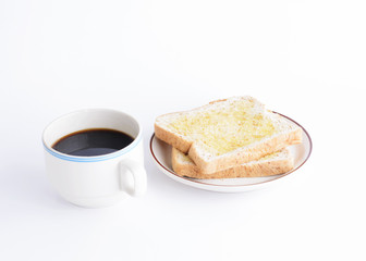 Coffee cup and sliced bread on white background