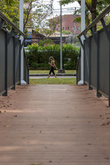 Woman jogging run in a outdoor park for exercise