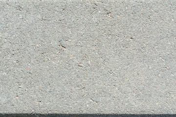 paving slab, texture of the structure of the concrete surface with fractions of small stones...