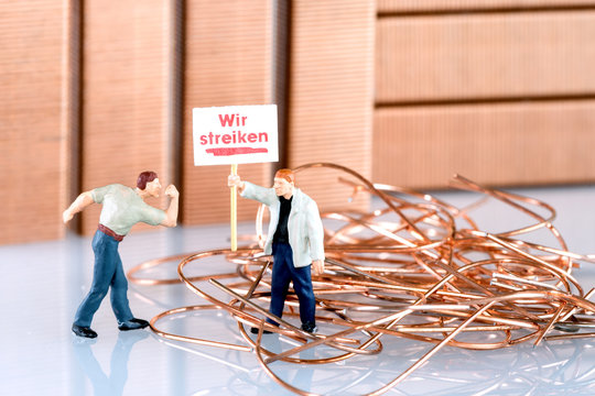 Metal workers on strike with large label - miniature models