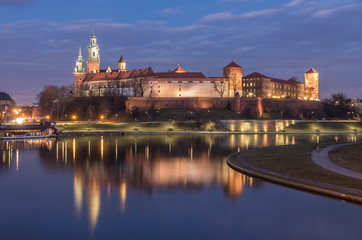 Krakow, Poland, Wawel Castle and Wawel cathedral over Vistula river in the night