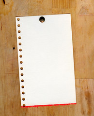 Sheet of paper on wood board