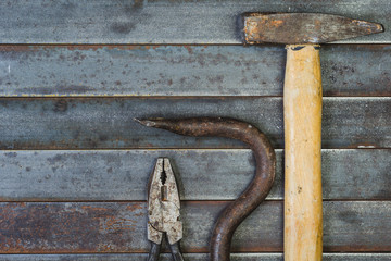 Set of various equipment, instruments and tools for manual work with copy space, carpenter tool old rusty metal background.