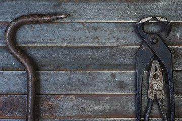 Set of various equipment, instruments and tools for manual work with copy space, carpenter tool old rusty metal background.