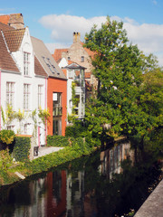 Fototapeta na wymiar Bruges Belgium historic houses on canal Europe