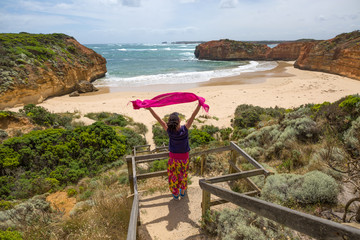 Woman enjoying her freedom with open arms, Australia
