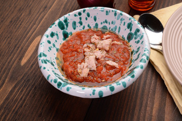 Condiment for pasta with tomato sauce and tuna
