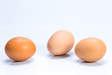 Three eggs isolated on white background