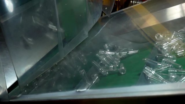 PET Preform bottle on conveyor belt