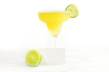 Lemon Margarita cocktail with blank card for copyspace