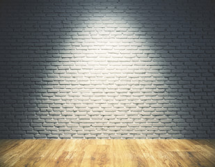 Empty brick wall with spotlight