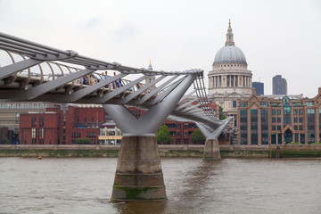 Millenium bridge and St Paul Cathedral in London, UK.