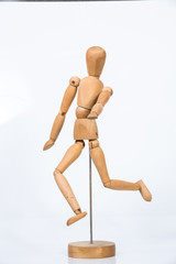 Wooden figure stand isolated on white background