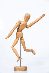 Wooden figure stand isolated on white background