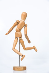 Wooden figure stand isolated on white background