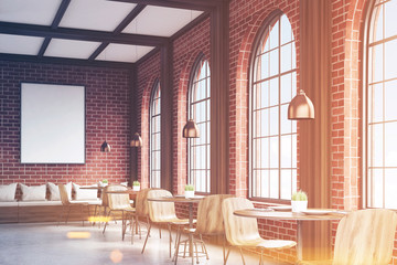 Side view of cafe with chairs, brick, toned