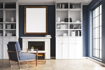 Living room with fireplace and blue armchair