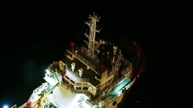 Oil production platform night top view