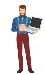Hipster holding a piggy bank and laptop notebook
