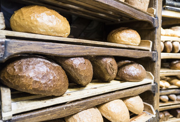 Freshly baked bread on wooden trays