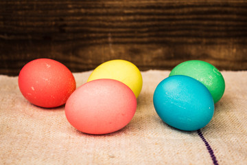 Fototapeta na wymiar easter color eggs on wooden background