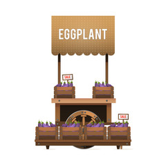 Fototapeta premium A street market. Wood cart for sale eggplant. Selling vegetables in the boxes. Vector illustration isolated on white background.