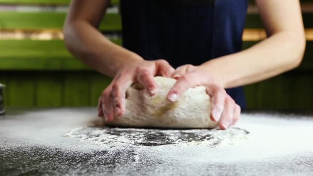 kneading the dough by hand