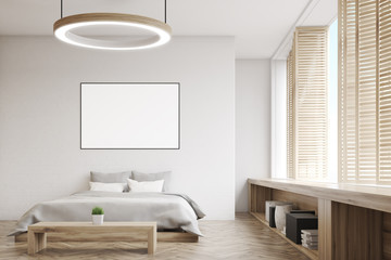 Bedroom with round lamp