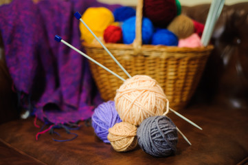 color knitting and balls in the basket