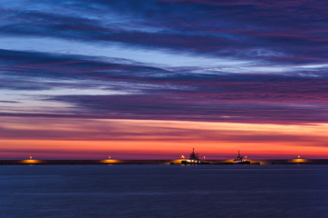 SUNRISE IN SWINOUJSCIE - Colorful dawn over the sea port   © Wojciech Wrzesień