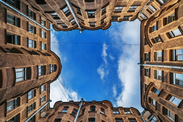 Ancient hight courtyards sky round St. Petersburg. Courtyard of the well in St. Petersburg, old architecture of St. Petersburg