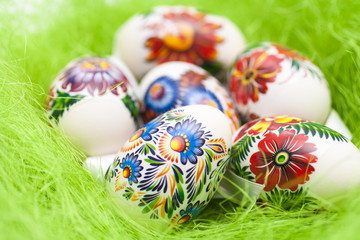 Easter eggs on green like grass background