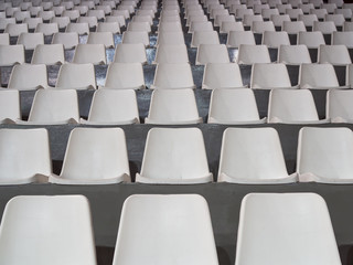 Rows of empty seats for the public