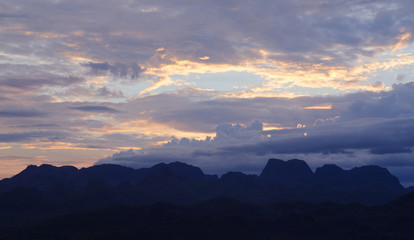 Beautiful summer landscape in the mountains with the sun at dawn