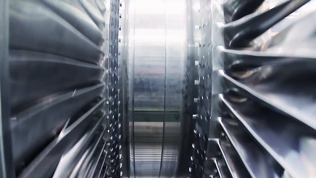 Frontal view of balancing steam turbine spinning rotor