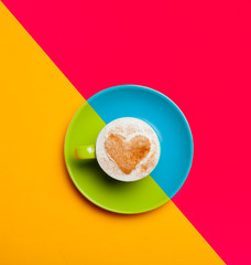 photo of cup of coffee on the wonderful colorful background in pop art style