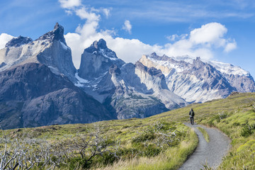 Fototapeta na wymiar Tourist on the road to Los Cuernos in National Park Torres del Paine in southern Chile, Patagonia