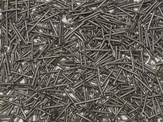 full frame background showing lots of metallic nails