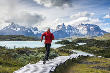 Running man on Torres del Paine National Park, Patagonia, Chile