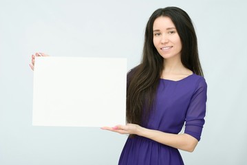 happy smiling woman with white blank board