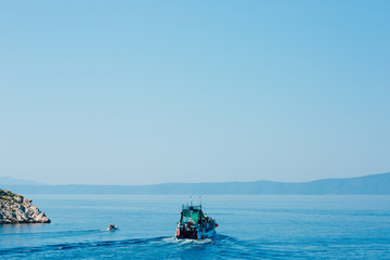 Ship with tourists, the city of Makarska, Croatia