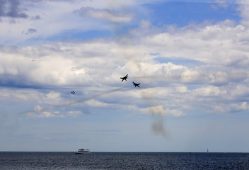 Two planes performing in an air show
