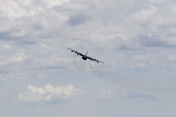 A plane performing in an air show