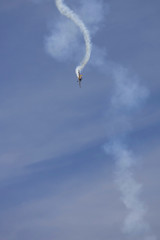 A plane performing in an air show