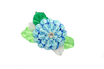 Kanzashi.Beautiful blue artificial flower with brocade, isolated
