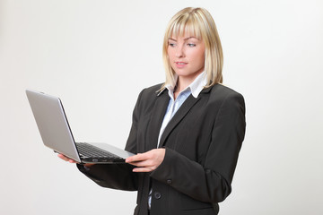 Businesswoman Girl with the laptop .