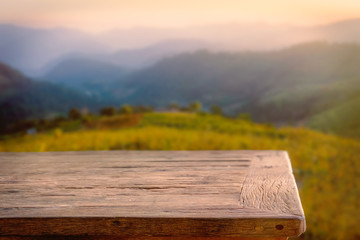 Empty wood table top on blur background of mountain. For display or montage your products